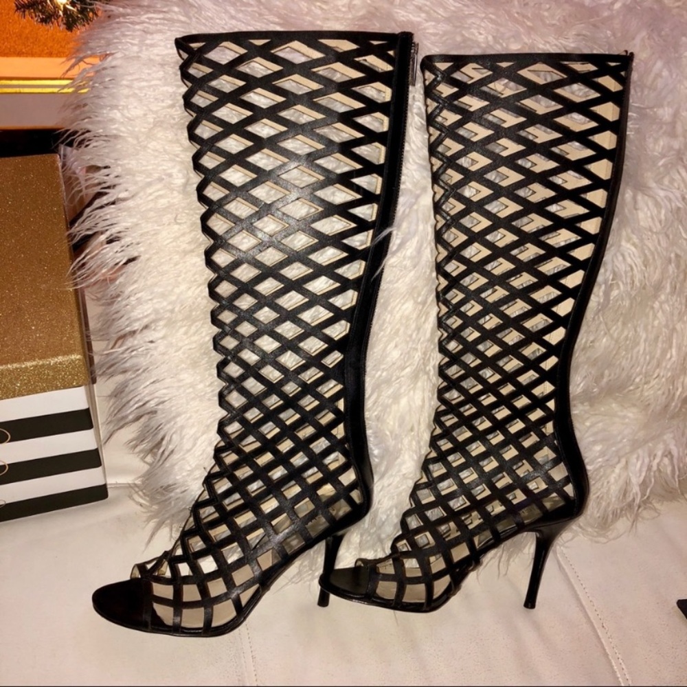 Black net sandal heel.